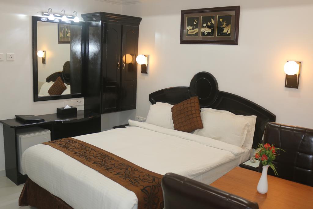 Gago Inn Thiruvananthapuram Zimmer foto